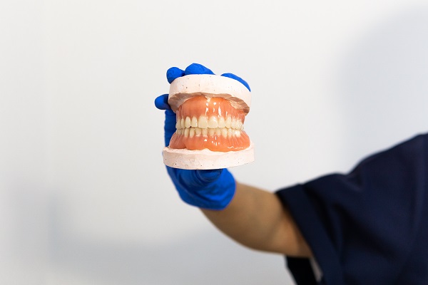 When Would A Dentist Recommend Replacing Old Dentures?